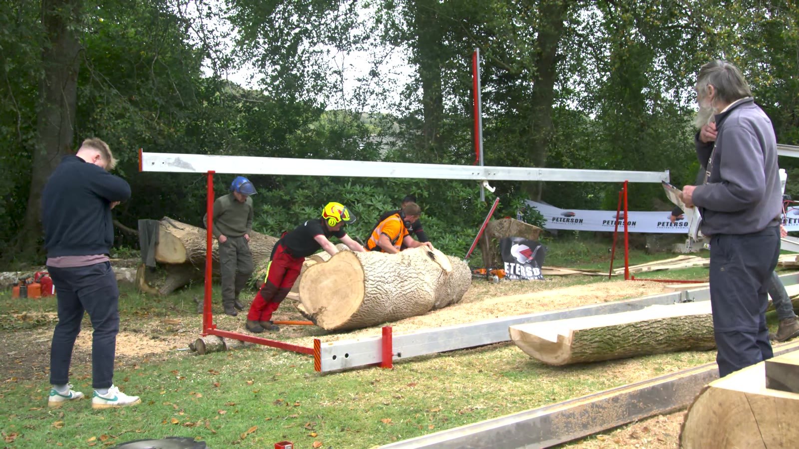 A demonstration setup around a log.
