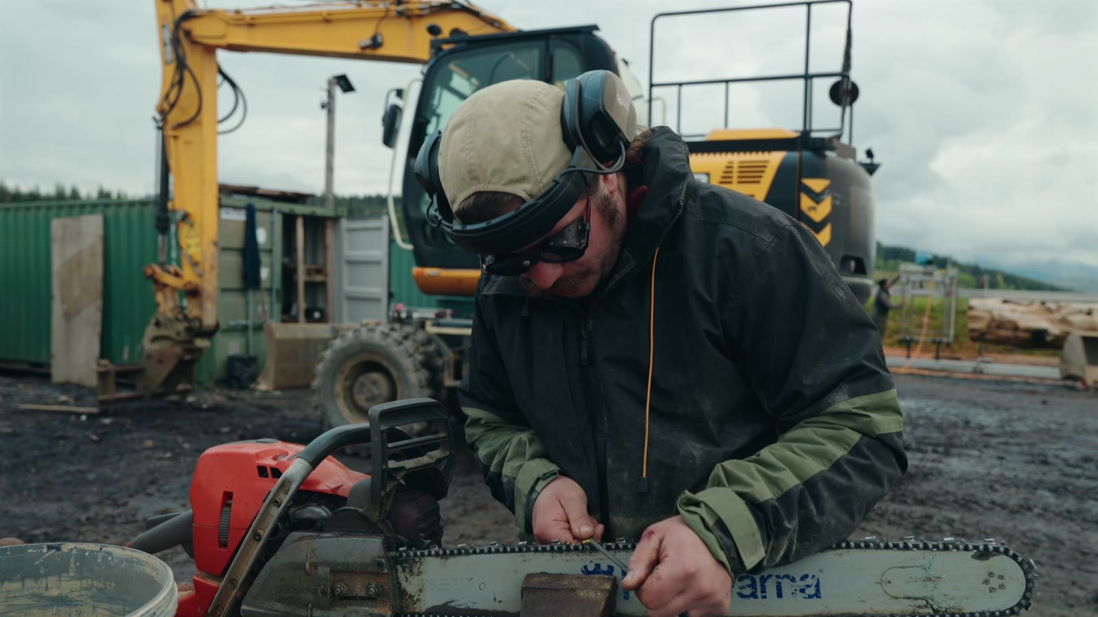 An operator maintaining the cutting equipment.