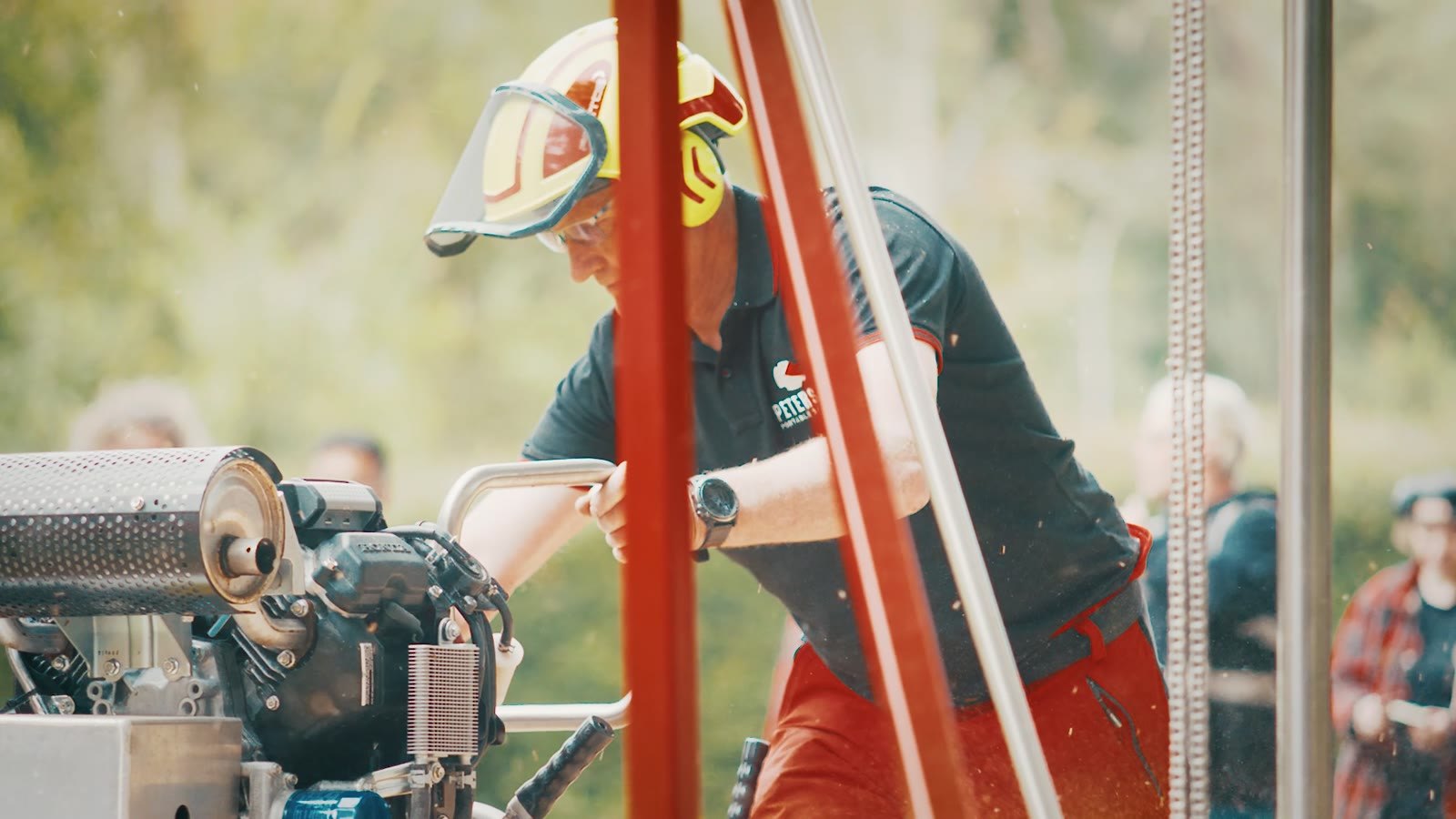A closer view of an operator at the mill.
