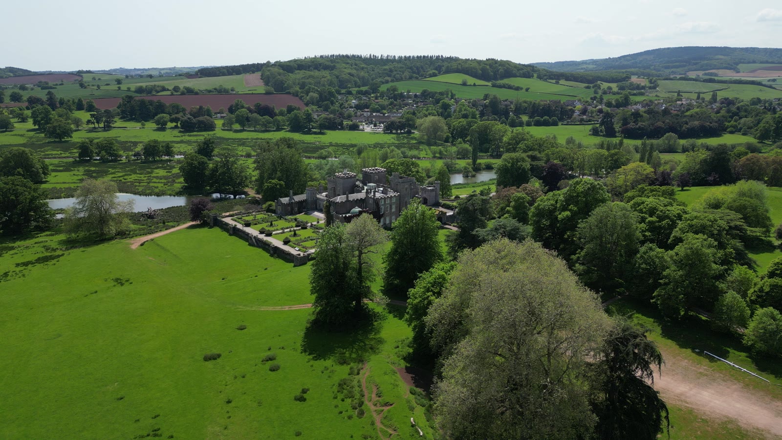 Trees, fields and buildings viewed from above